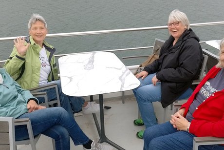 Sitzen auf dem Oberdeck