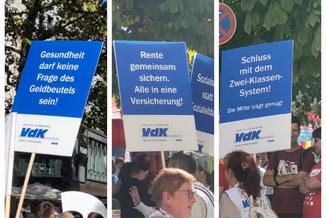 VdK und DGB-Mitglieder mit Transparenten
