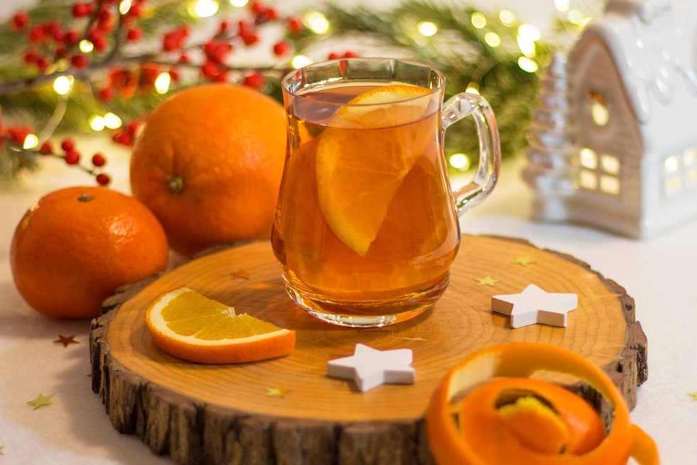 Einladung zum Adventskaffee Orangen und Tee
